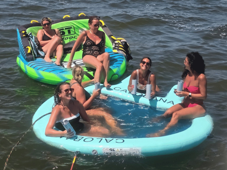girls group on outer banks tubing trip with causeway watersports