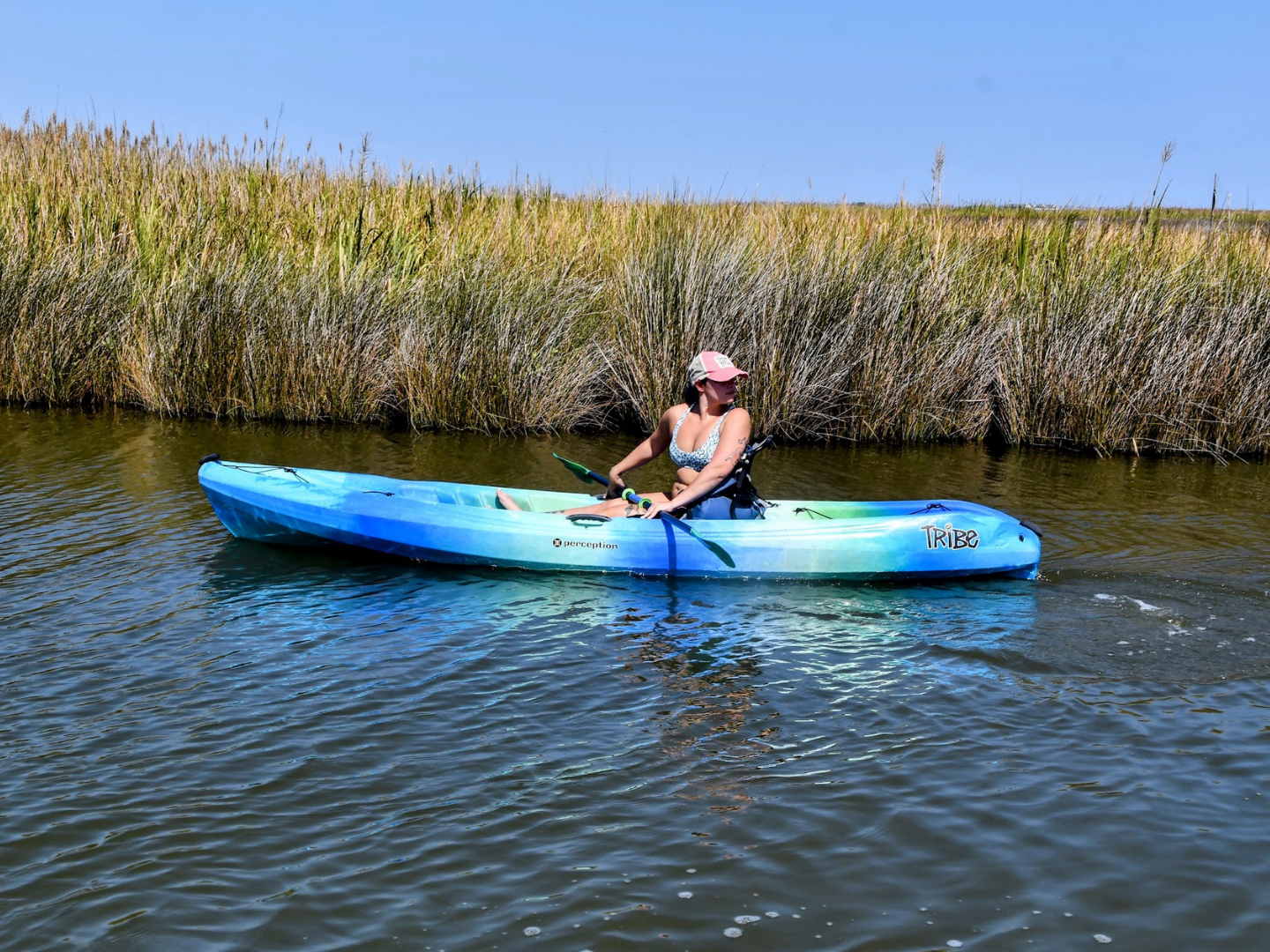 woman on kayak rental paddling in Nags Head