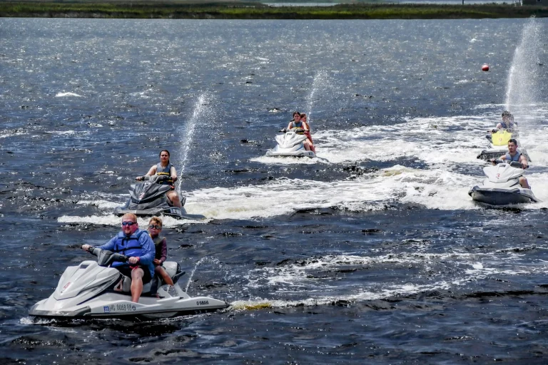 Group of jet skis riding together on an Outer Banks guided tour