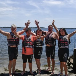 Customers having a great time after their activity at Causeway Watersports.