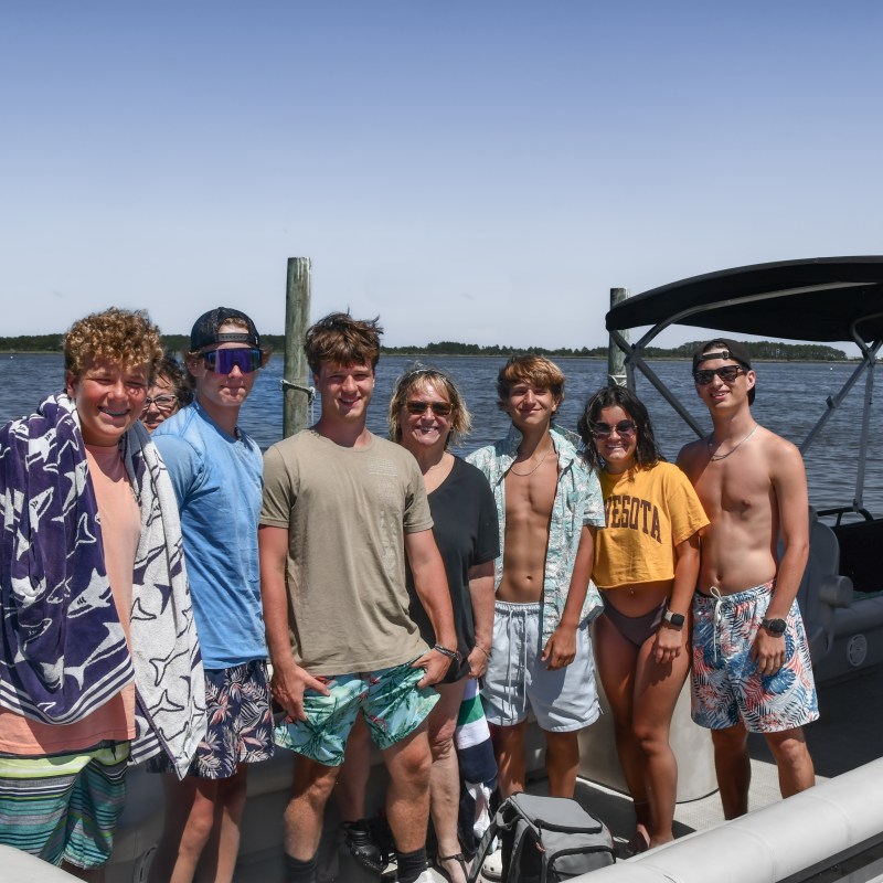 A family poising before the start of their pontoon rental in Nags Head.