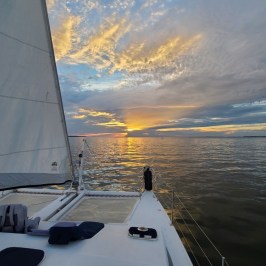 A beautiful sunset on board a sunset sailing charter in Nags Head.