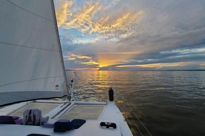 A beautiful sunset on board a sunset sailing charter in Nags Head.