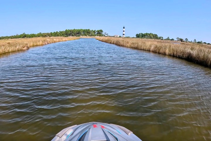 A view of Bodie Island Light house from a jet ski, on a tour with Causeway Watersports in Nags Head NC.