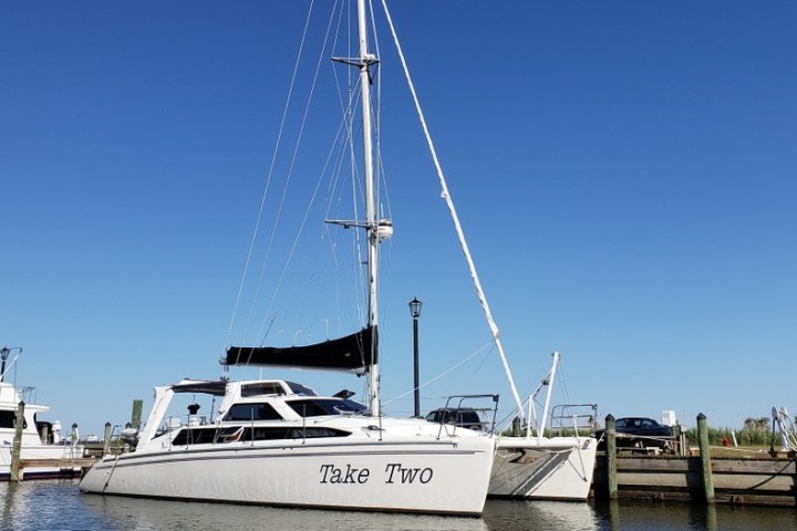 a boat is docked next to a body of water